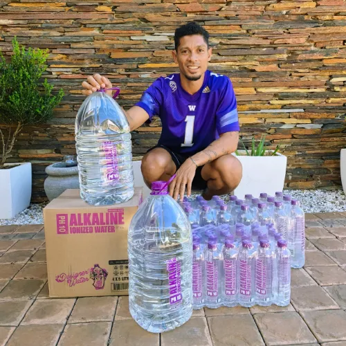 Wayde van Niekerk with Designer Water bottles and cases