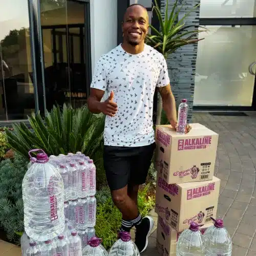 Akani Simbine with Designer Water bottles and cases