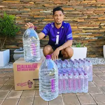 Wayde van Niekerk with Designer Water bottles and cases